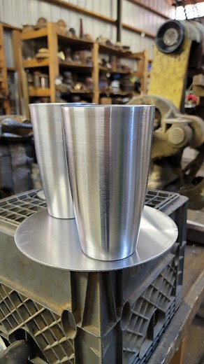 Working down my circle sizes for these shakers. Grabbed a piece of scrap 3003-H14. 063 that started at 10 1/2" and ends up 7 1/4" deep and 4 1/4" in diameter on the open end. I have a steel blade in my hand when I am scraping down the high spots and getting rid of the lubricant. Copper to come. #metalspinning #metalspinner #metalforming #metalart #metalartist #aluminium #aluminumforming | Northwest Metal Spinning