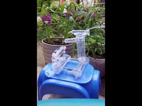 11. A watermill made from syringes