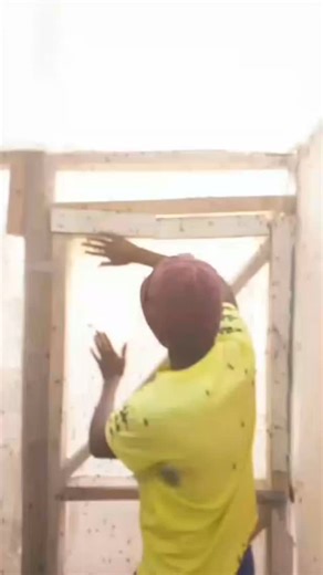 One of our young men interacting with our Black Soldier Fly (BSF) at their final life cycle stage. These flies only live for 5-10 days but are very important as they're responsible for future generations, reproducing 500-900 eggs each during their short life. This is one of the many little wonders you will notice when you visit Osiligi! #Flies #BSFFarming #FutureGeneration #VisitOsiligiFarm #BSFFacts | Osiligi Farm