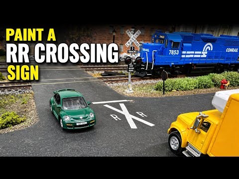 Painting a Railroad Crossing Road Sign