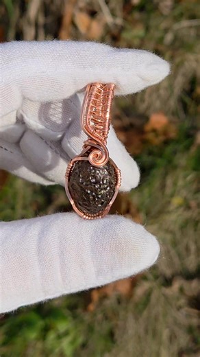 Columbianite is a rare, ancient volcanic glass, also called Piedra Rayo or "Lightning Stone," that is found in Colombia. It is similar to a tektite but is technically an ancient form of obsidian, estimated to be 30 million years old, and is a collector's item due to its rarity. The stone is black in its raw state but can appear gray-brown to gray-purple when light shines through it and is considered a sacred stone by the native Muisca tribe. (From Google) | Lone Stone Designs