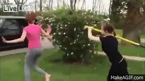 girl fight gets hit with shovel on Make a GIF
