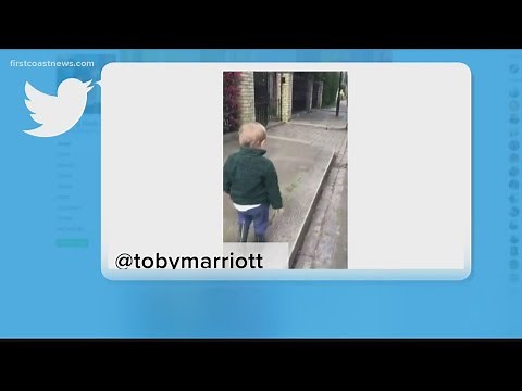 Adorable little boy says hello, good morning to everything despite streets being empty