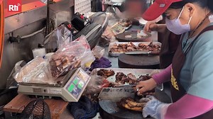 1.2K views · 66 reactions | In #Taiwan, the pork trotter dish symbolizes wealth and fortune, a much-desired element of Lunar New Year celebrations. With the busy holiday season approaching, meal plans are already afoot and popular vendors are packed with buyers. | Radio Taiwan International | Facebook