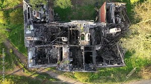 Derelict burnt-down house after heavy fire Aerial