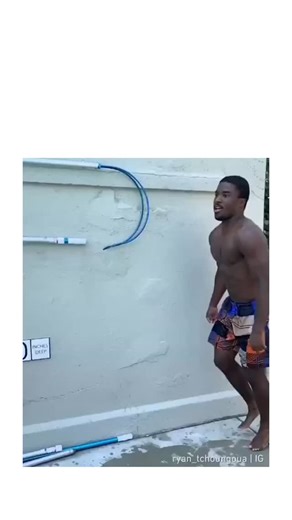 @user_missinng on Instagram: "The post features a viral video of a lifeguard executing an extraordinary high dive from a poolside building into the water, creating an illusion of flight that has garnered over 1.4 million views since its upload on 26 December 2025. Originally watermarked from Instagram user ryan.tchoungou, the clip showcases athletic prowess in a public pool setting with onlookers, blending wholesome spectacle with the account's ironic humour style. Replies predominantly riff on 