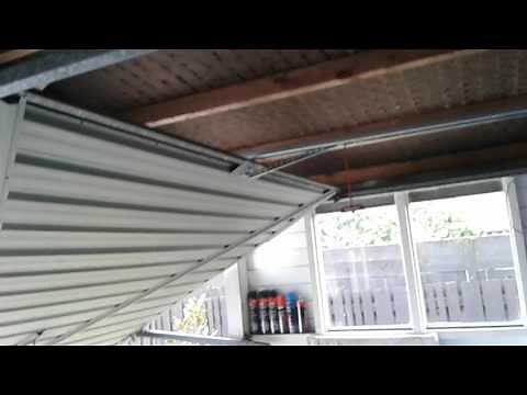 tilt garage door with newly installed Merlin garage door opener