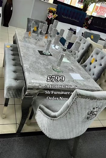 ✨ BRAND NEW LUXURY DINING SET – AVAILABLE NOW (UK) ✨ Upgrade your home with this stunning Denver Grey Marble Dining Table paired with 6 Majestic Lion Knocker Chairs – a perfect blend of luxury, comfort & modern design. 🪨 Denver Marble Dining Table (Grey) ✔️ Brand New ✔️ Premium light grey marble-effect top ✔️ Elegant pedestal base ✔️ Size: 180cm x 90cm ✔️ Comfortably seats 6 people ✔️ Strong, stable & easy to maintain 🪑 6 Majestic Lion Knocker Dining Chairs ✔️ Brand New Luxury Chairs ✔️ Soft-t