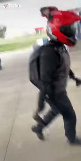 Tik Tok motorcycle guy washing helmet gas station funny