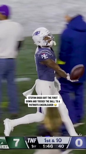 Stefon Diggs Tosses Ball to Patriots Cheerleader