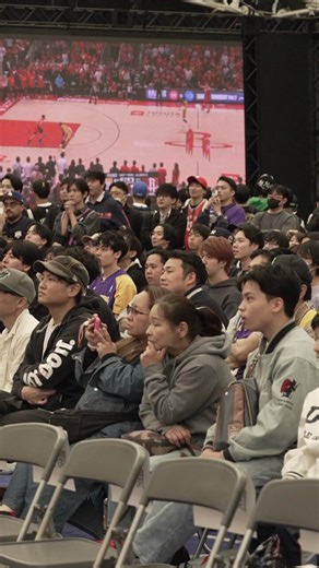older lady front center sitting whole body tensed up stressed as hell while the men jumping around with their phones is so real 😭
