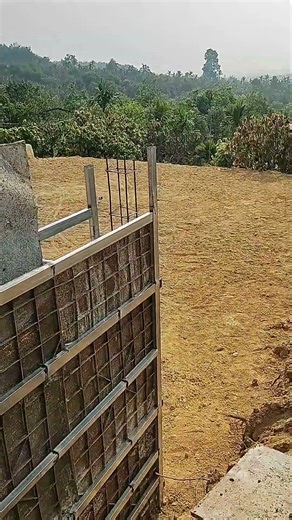 first walkout basement concrete style home building in vietnam: framing almost done.