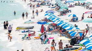 Video shows shark at Navarre Beach get too close for comfort with swimmers