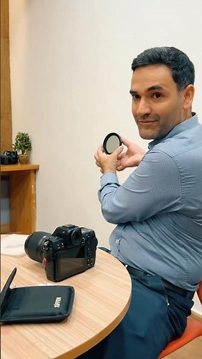 Photography class in which students are learning how to use an ND filter & clean camera properly