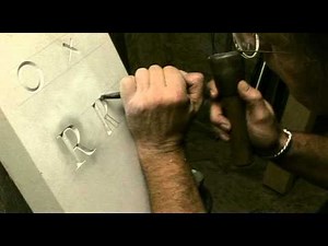 Cutting a Letter in Stone