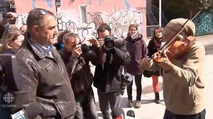 Homeless man given violin