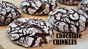 Fudgy And Chewy CHOCOLATE CRINKLES How to make the classic chocolate crinkles. This recipe yields 12 big crinkles or 24 small crinkles. Here's what you'll need: 3/4 cup unsweetened cocoa powder (60g) (I use Hershey's pure cocoa powder and it measures 20g per 1/4 cup) 1/2 cup brown sugar (95g) 1/2 cup white sugar (95g) 1/4 cup oil (50g) 2 large eggs 1 teaspoon vanilla 1 cup all purpose flour (120g) 1 teaspoon baking powder (5g) 1/2 teaspoon salt (3g) 1/2 cup icing sugar (60 grams) Thank you for w
