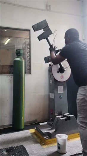 IMPACT TEST SAMPLE PREPARATION AND BREAKING V-NOTCHED MACHINED STEEL SQUARE BAR IN LABORATORY