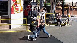 Surveillance video shows federal agents tackle elderly car wash owner during ICE arrests