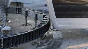 Ski resort. The mechanism of the ski lift, the movement of cabins , gears, shock-proof rollers in the work. Ski lift cabins in action Operation of various mechanisms of the lift in action at the ski