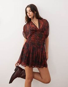 Reclaimed Vintage mini dress with cape sleeves and shirred waist in blurred red print | ASOS