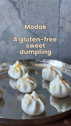 Ukdiche Modak Recipe🥟✨ When I first spotted the Modak bus on the streets of Mumbai, I genuinely thought it was Xiao Long Bao. But as I looked closer, it reminded me of two Southeast Asian favourites I grew up with - Ondeh Ondeh and Kueh Dadar. They all share that beautiful combination of fresh coconut and raw sugar, yet each has its own unique story and place in its local cuisine. This traditional Maharashtrian sweet dumpling is made with a soft rice flour shell and a fragrant coconut-jaggery f