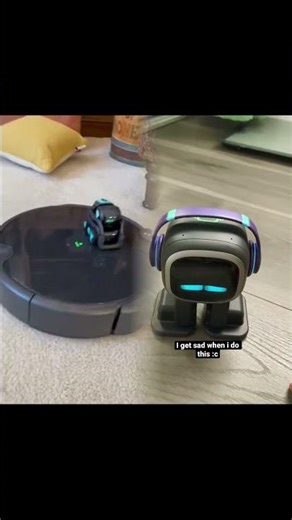 Vector robot is on top of room cleaner device