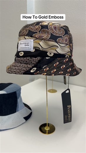 DIY gold embossing is easier than you think! I wanted specialty garment hang tags for my brand, @Blueprint Signature so I cut card stock with my Cricut. Then I used embossing ink and embossing powder to add my logo. What do you think? #diy #branding #hangtags #embossing #packagingorders #custommade #buckethats #sustainablefashion #imadethis