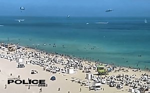 Video captures helicopter crashing near a crowded, sunny Miami Beach