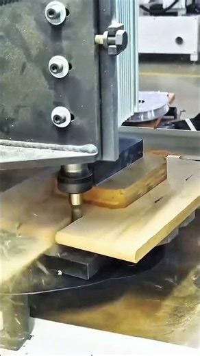 Hydraulic press pressing layered wood block
