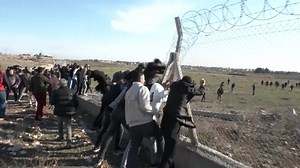 Turkey probing flag burning at protests along Syrian border