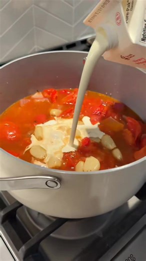 Tomato Basil Soup @jacquelinethoma ⬇️RECIPE⬇️ Roasted Tomato Basil Soup: 6 larger vine tomatoes, quartered 2 cups grape tomatoes 1 large red onion, quartered 1 red bell pepper, chunked 2 bulbs garlic 2 tbsp olive oil 2 tbsp tomato paste 1 tsp oregano 1 tsp thyme 3 tbsp fresh basil (more or less depending on desired potency) 1 cup vegetable broth 1 cup heavy cream 1 tbsp sugar 1/4 cup parmesan cheese salt to taste pepper to taste On a baking sheet, add tomatoes, onion, red pepper and bulbs of gar