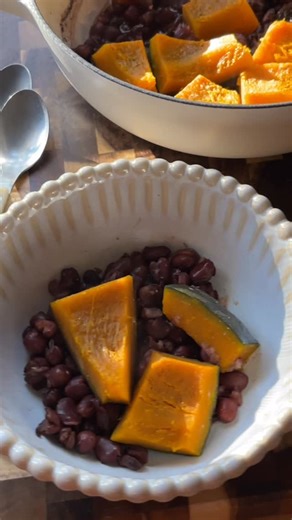 Yoko Segawa on Instagram: "In Japan, winter solstice food is about luck, warmth, and care. Kabocha for health, adzuki for protection. Eating those foods believed to protect the body, invite good fortune, and help us cross into the next season well. I cooked them in the simplest way. Simmer the adzuki with kombu for about 30 minutes. Once tender, layer kabocha on top, sprinkle a pinch of salt, cover, and steam until soft. A pinch of salt draws out the kabocha’s natural sweetness. It’s a humble wa