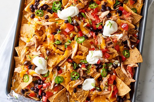 These Easy Sheet Pan Chicken Nachos Will Make You a Dinner Hero