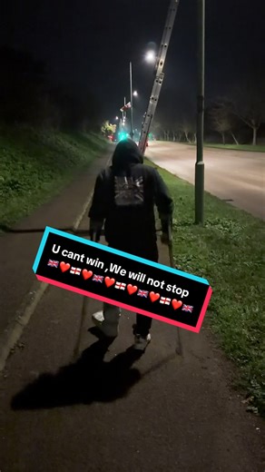Flag Man and Flagger Charlie return to Peto Way 💪🇬🇧 Back again to clean up the mess left behind by the flag haters. But here’s the thing… Charlie’s turned up in a moon boot 🥾 Broken foot or not — he’s still out there. No surrender. No excuses. Old ripped flags removed. Fresh St George’s Crosses up. Cleaned up, shining, and looking proud again 🇬🇧✨ Charlie fights on. Flag Man flies them. The flags go back up — every time. Thank you to every single one of you for the support ❤️ This is what c
