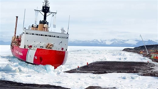 US icebreaker moves frozen dock in polar waters
