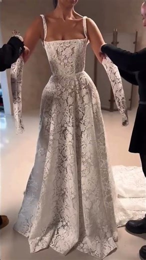 To order this ivory lace ball gown DM This romantic couture gown features a structured corset