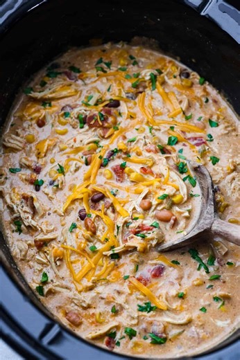 Recipe here: https://therecipecritic.com/crack-chicken-chili/ Creamy crack chicken chili is an explosion of irresistible flavors! It’s loaded with shredded chicken, tender beans, corn, AND all your favorite crack-inspired ingredients. | The Recipe Critic