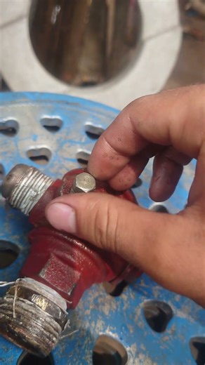 fitting the non return valve nut..