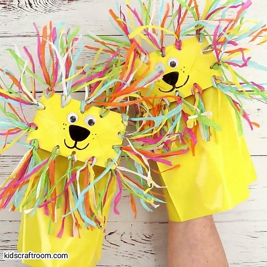 ROAR!!!! Make adorable Paper Bag Lion Puppets. They're super easy and great for imaginative play! See the full details here: https://kidscraftroom.com/paper-bag-lion-puppet-craft/ | Kids Craft Room