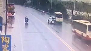 Rollover crash sends bus into river after colliding with SUV in China