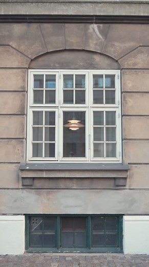 Look up and see the light For 150 years Louis Poulsen has lit up Copenhagen as the First House of Light. From first groundbreaking design by Poul Henningsen, the city has been an organic extension of the Louis Poulsen showroom, guiding the way through historical cobble streets with warm beams from windowsills after windowsills. Just look up. https://brnw.ch/21wXjQz | Louis Poulsen