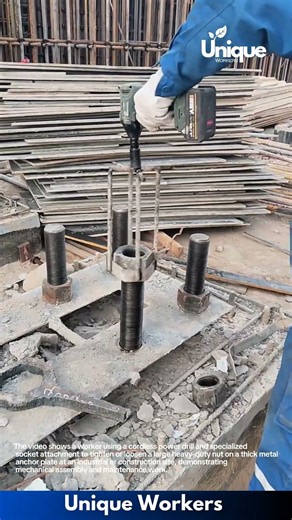 Industrial Maintenance: Worker Using Cordless Power Tool to Tighten Large Bolt on Metal Plate