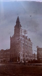 Erected in 1891, the Review Building stands as one of Spokane's oldest and most distinguished landmarks. Designed by architect Chauncey B. Seaton in the Romanesque Revival style, its red brick façade, Montana granite accents, and soaring tower have graced the city's skyline for over a century. Originally constructed to house the Spokane Falls Review newspaper, the building became the epicenter of Spokane's journalistic endeavors. Following the economic downturn of 1893, media mogul W.H. Cowles a