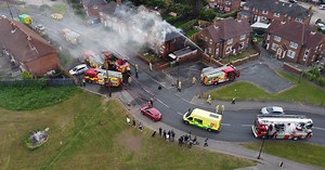 Dramatic moment Leeds house is engulfed in flames