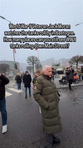 World War II Veteran Jack Moran watches the tanks roll by in Bastogne. How many places can you still see WW II tanks rolling down Main Street? #ww2 #ww2history #bastogne #neverforget #belgium | Walk Among Heroes
