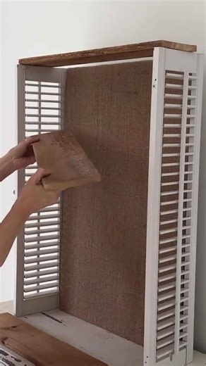 She puts old shutters in her entryway for this brilliant storage idea!