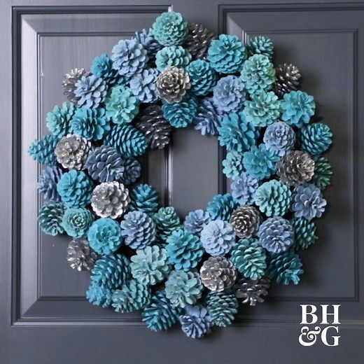 Don't drop big bucks on a fancy wreath. You can make your own for the holidays (or any time of year!) with pinecones, spray paint, and a few other basic craft supplies. Here's how: https://trib.al/vjWDYd3 | Made by Me