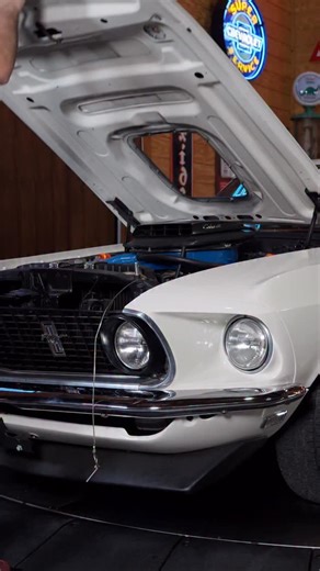 FOR SALE: 1(800)562-7815 | www.noreserveclassics.com Soft Sounds, Big Power — A rare 1-of-2 ’69 Mach 1 Cobra Jet in pure ASMR bliss. Stock Number NRC6972 Relax into the subtle clicks, rumbles, and calm details of this ultra-rare 1-of-2 1969 Ford Mustang Mach 1 428 Cobra Jet Sportroof. From its factory-correct 428 Cobra Jet V8 and 4-speed manual to its Wimbledon White finish, restored Deluxe interior, and pristine red-oxide underbody, every sound and detail whispers classic American muscle at its