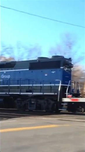 2 GATX GP38-2 engines with a spongebob engine on CSX train.